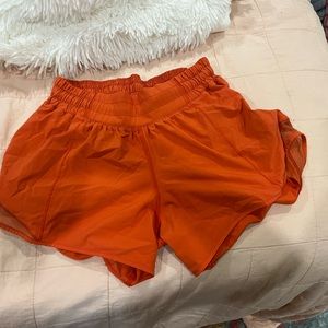 Size 4 orange/coral lululemon hotty hot shorts